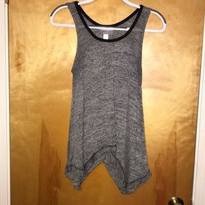 No sleeve, asymmetrical , Gray and black marled.